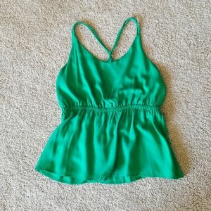 Green peplum tank
